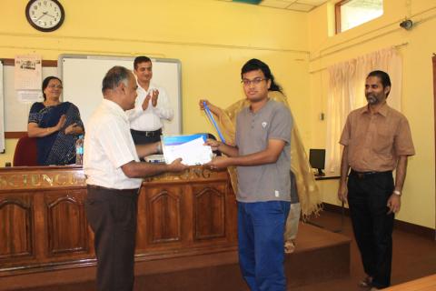 Mr. Ankur Jyoti receiving the Best Outgoing Student Award from Prof. S Chandraka